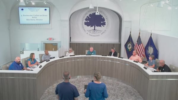 Elizabethtown Stormwater Director Rita Davis at the podium during the August 10, 2026 city council work session, with the agenda item displayed on screen