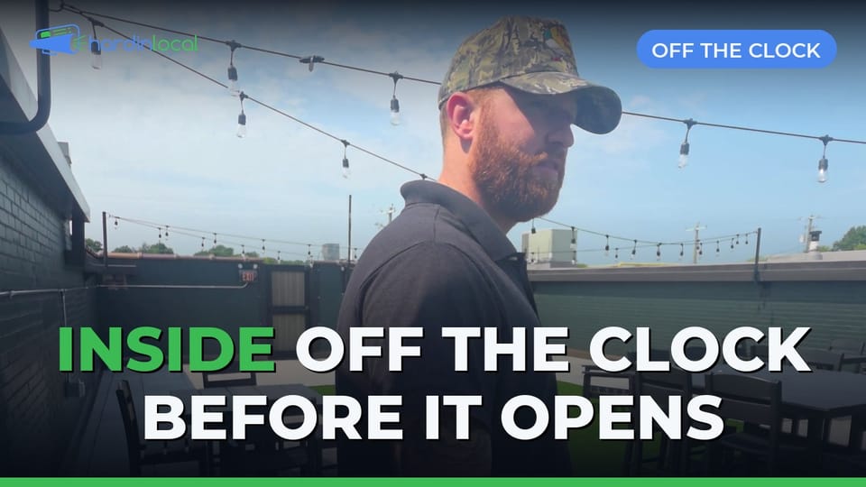 Off The Clock general manager Caleb Powers on the rooftop patio above the Social Food Hall in downtown Elizabethtown, string lights and patio tables in place before the bar opened